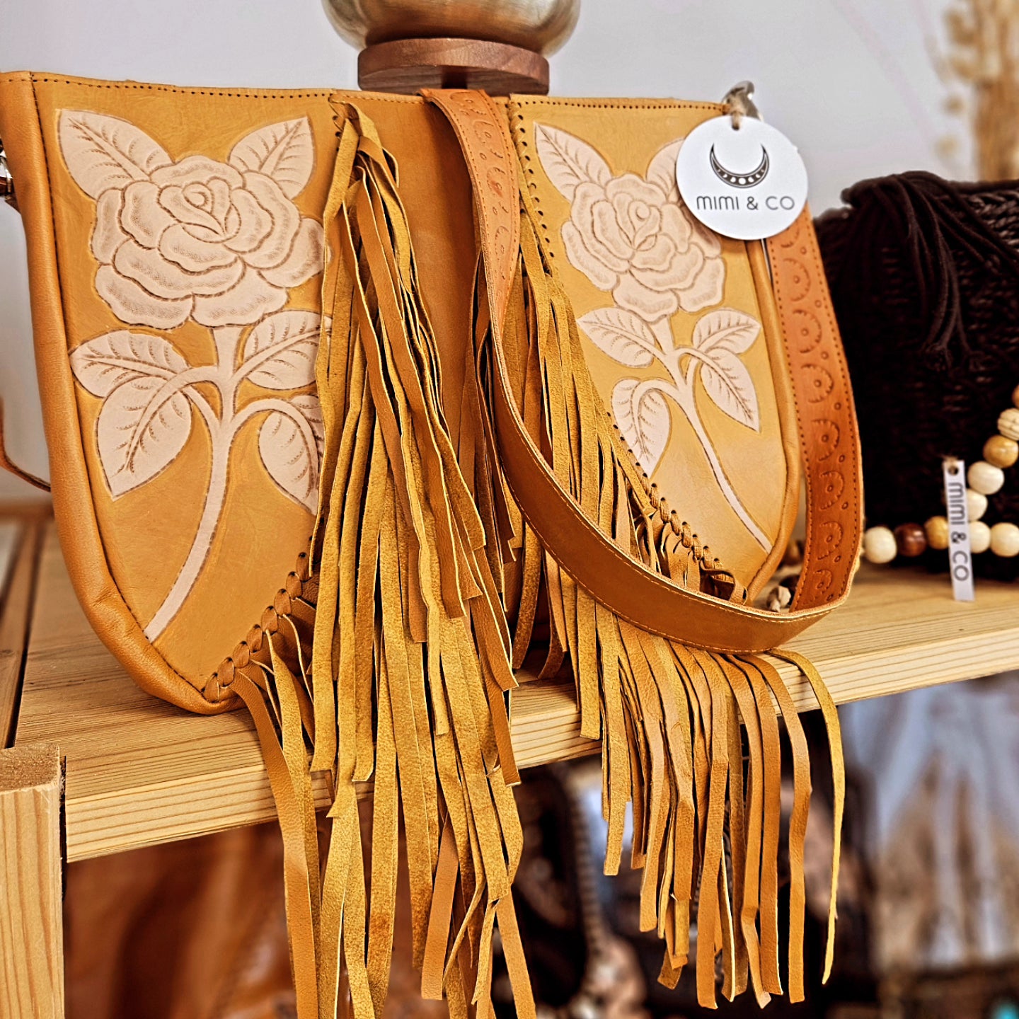 Rose carved tassle bag